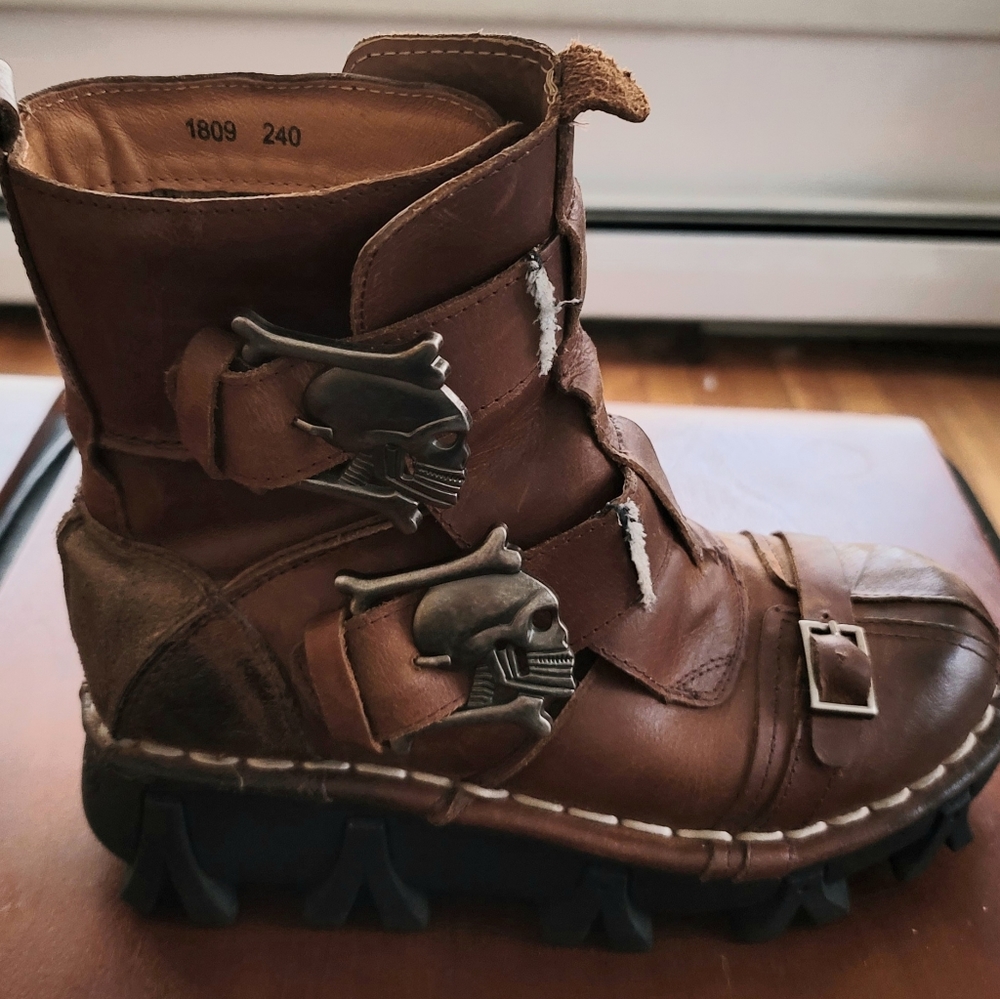 Women's distressed leather skull boots